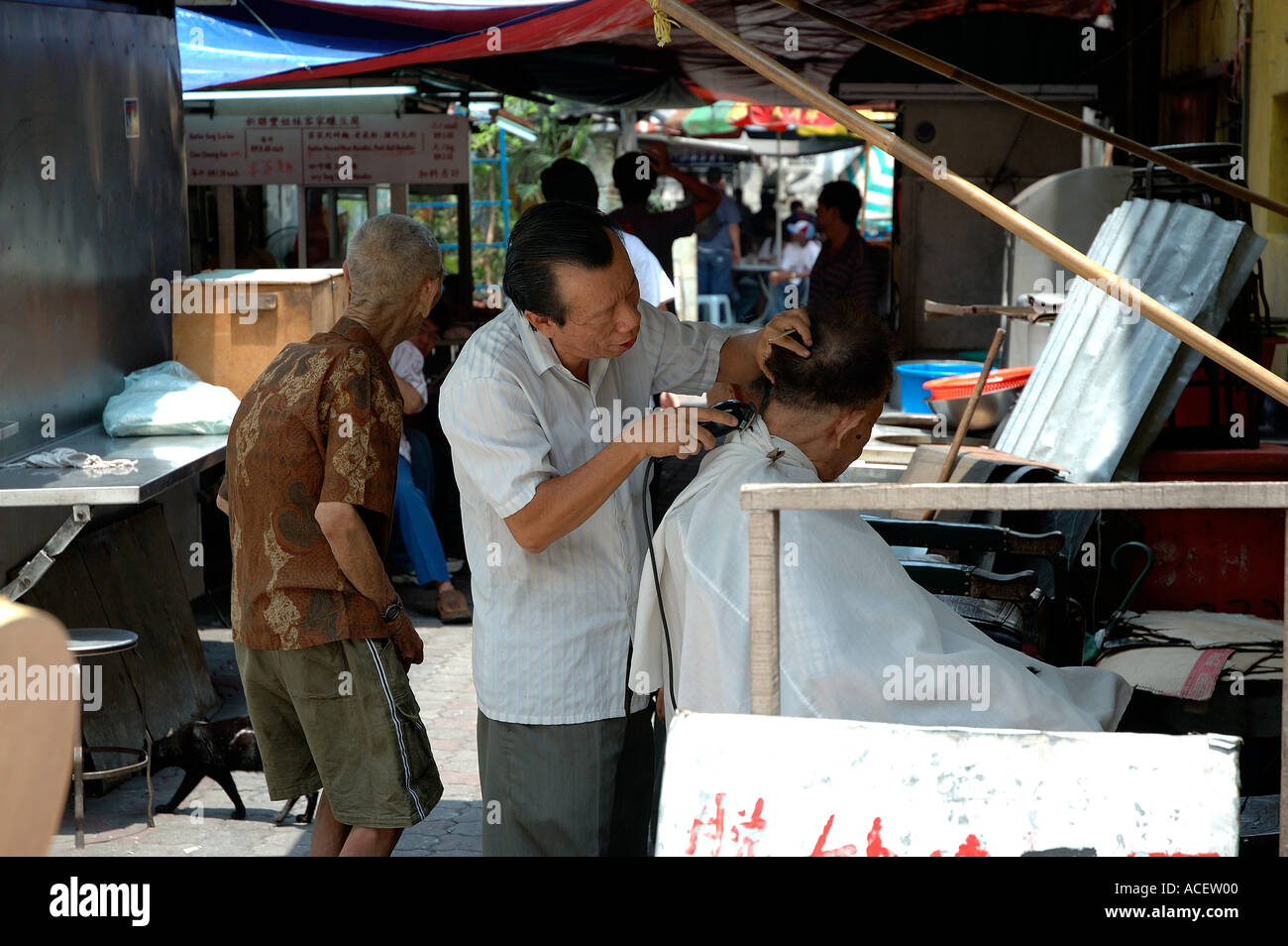 Open air barber shop in Petaling Street Malaysia Stock Photo Alamy
