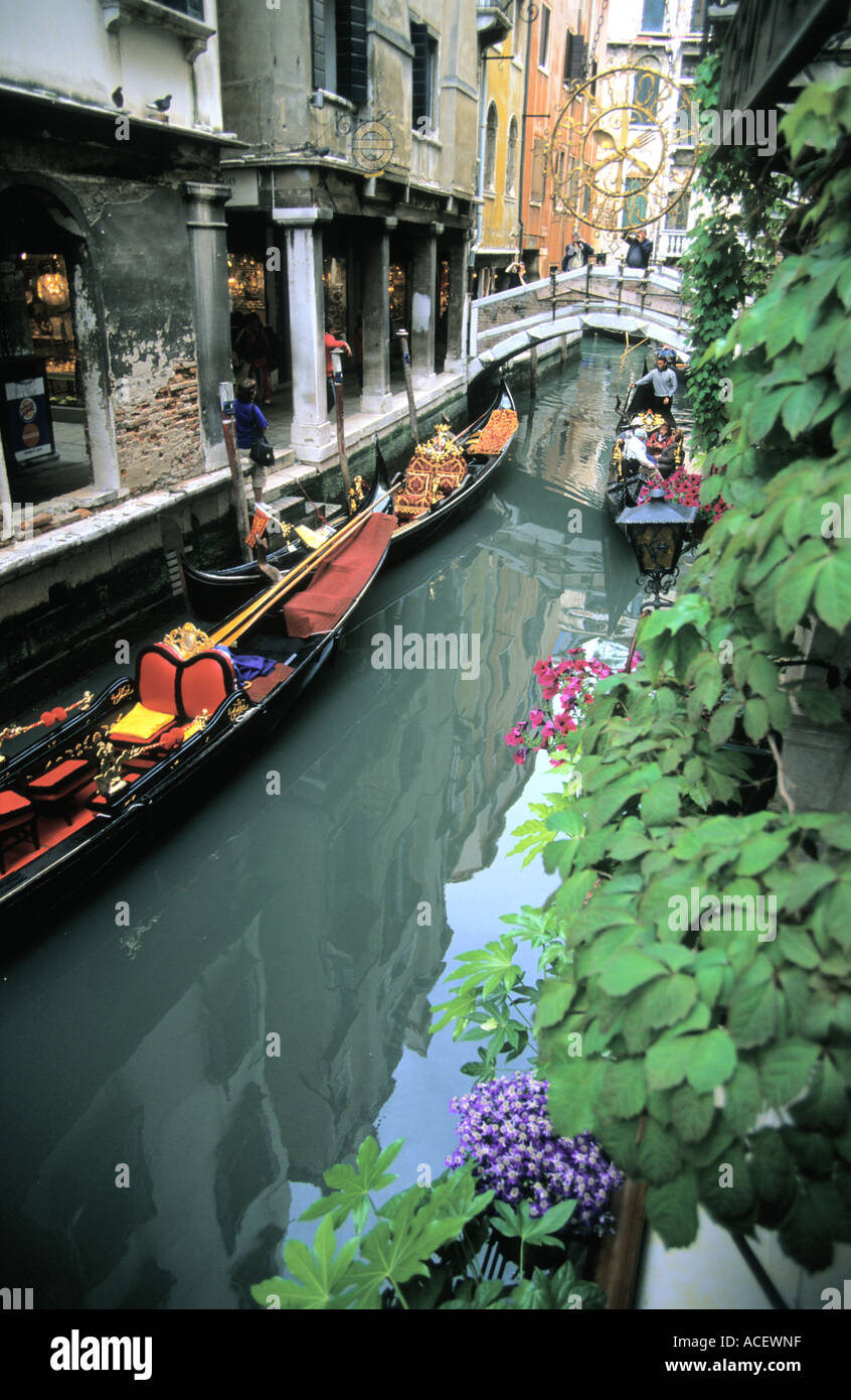 Street scene water channel and gondolas in Venice Italy Stock Photo - Alamy