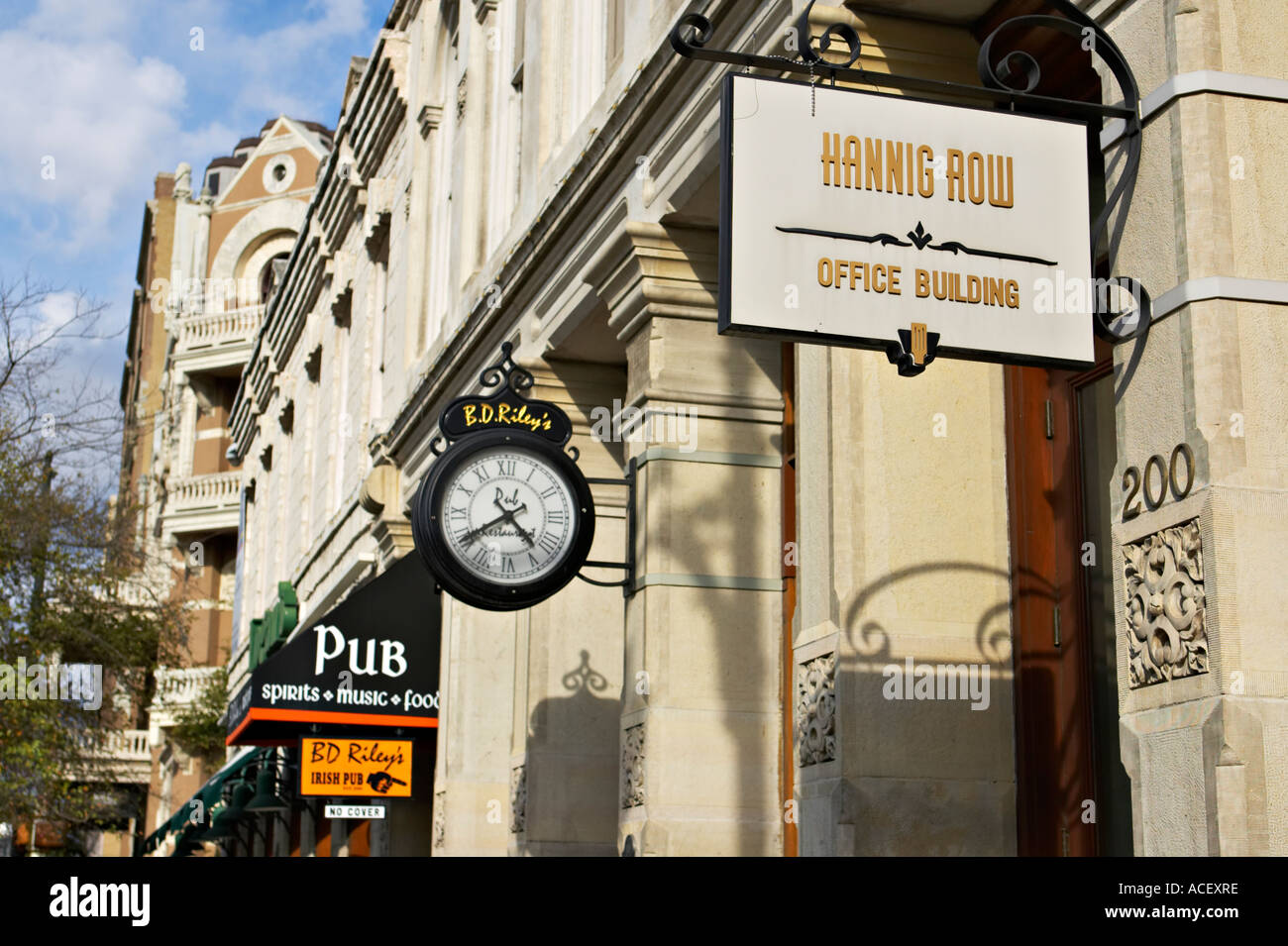 TEXAS Austin Clock and signs on buildings on Sixth Street entertainment