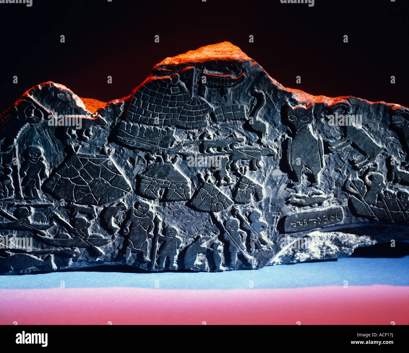 Inuit carvings on a rock Stock Photo Alamy