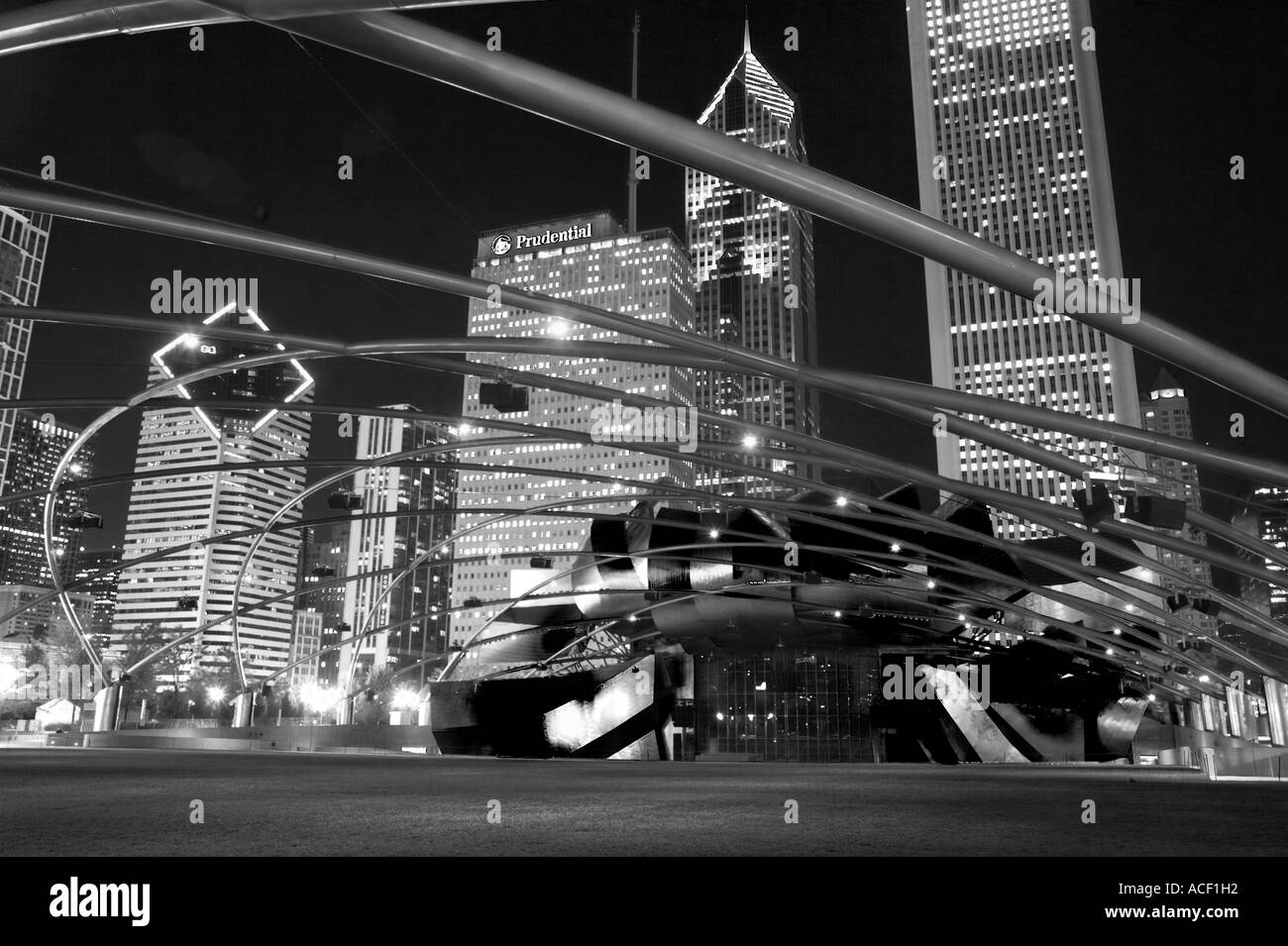 PARKS Chicago Illinois Prizker Pavilion in Millennium Park modern stainless steel design musical venue at night Stock Photo