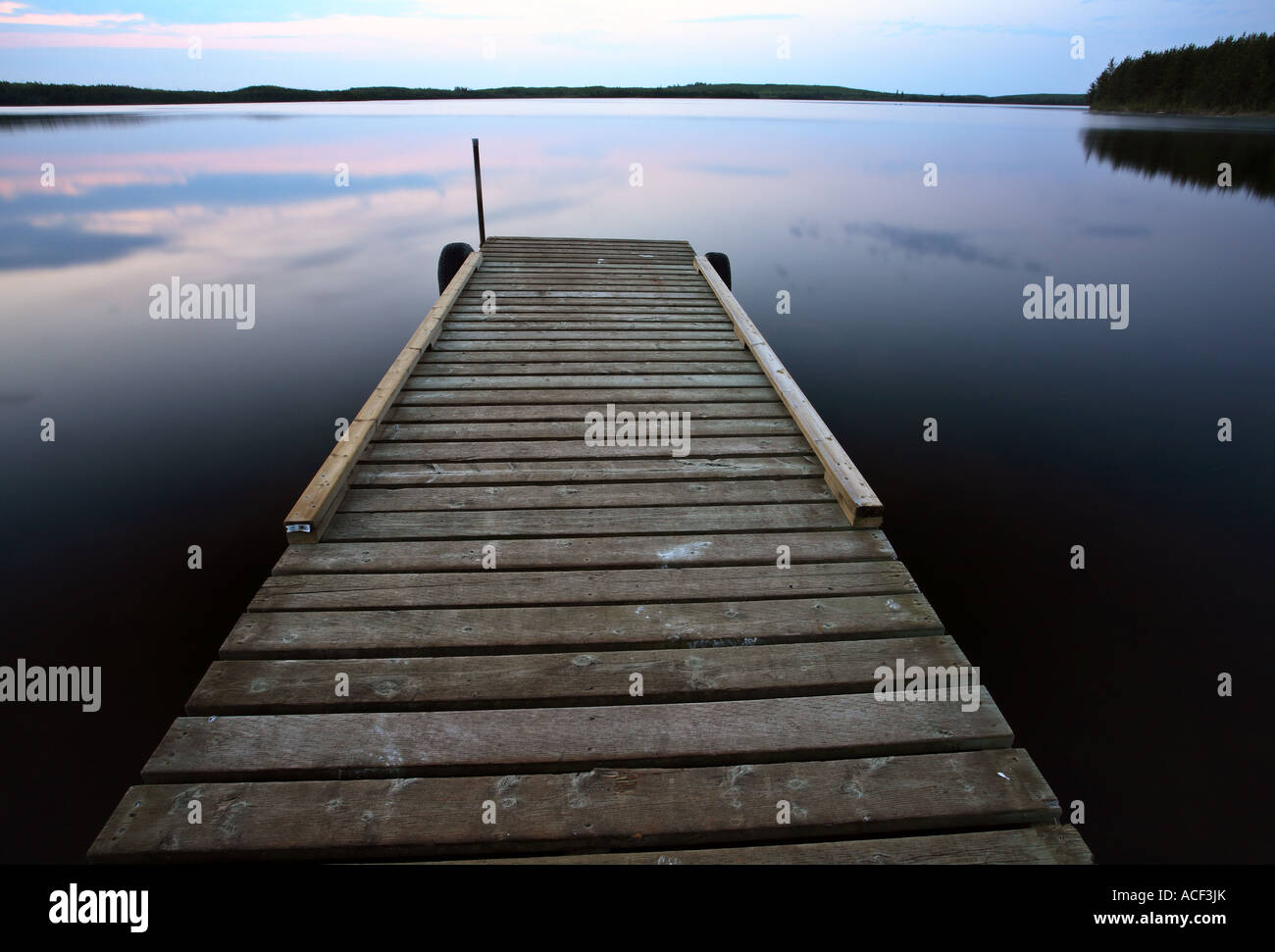 Boat dock at Smallfish Lake in scenic Saskatchewan Stock Photo Alamy