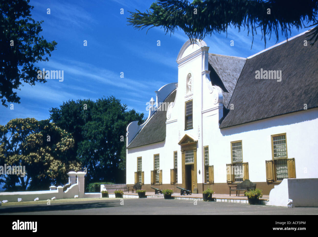 The Groot Constantia building in the Cape Wine lands - one of the oldest wine estates in South Africa Cape Dutch architecture. Stock Photo