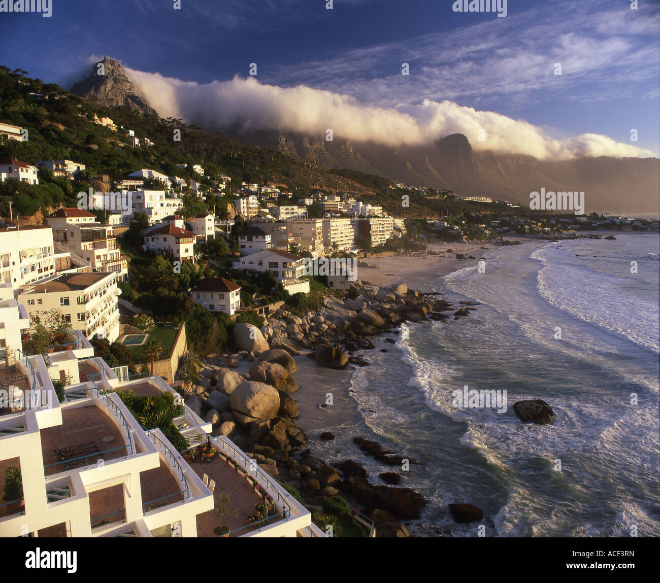 The Cape Town suburb of Clifton and the twelve Apostles covered in cloud in the background Stock Photo