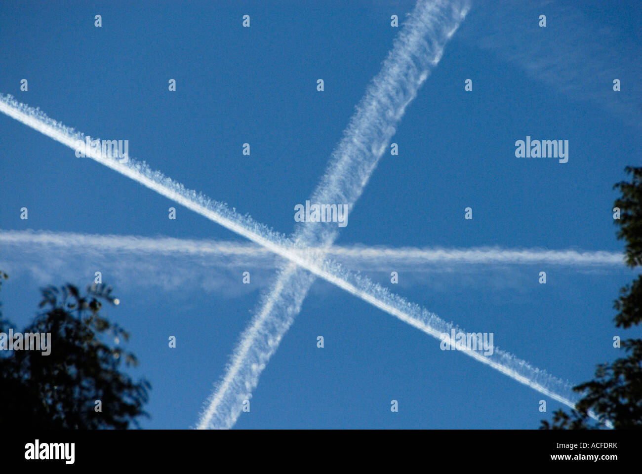 contrails in the sky Stock Photo