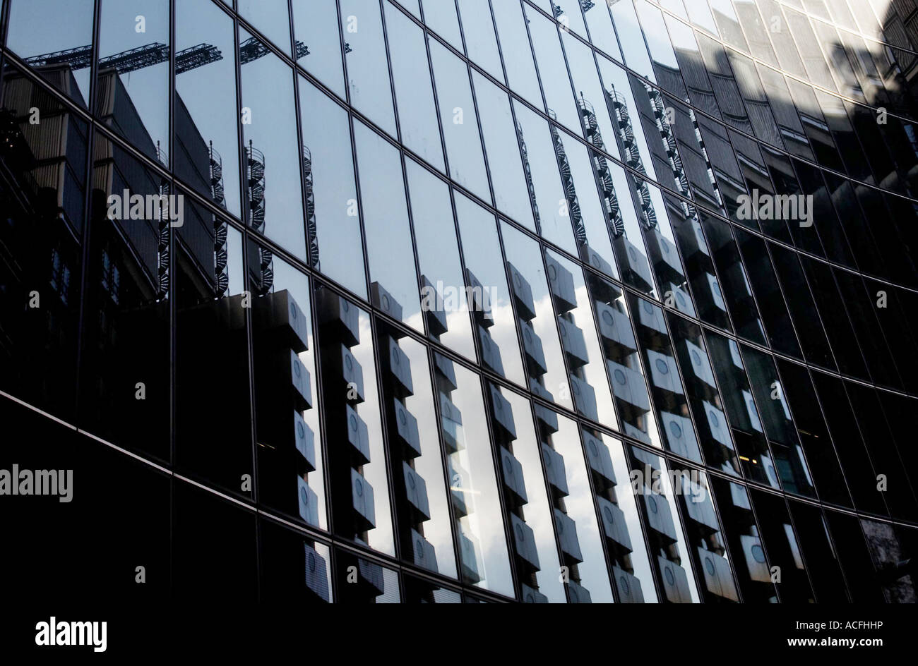 reflection in facade of Willis building in financial district London UK Stock Photo