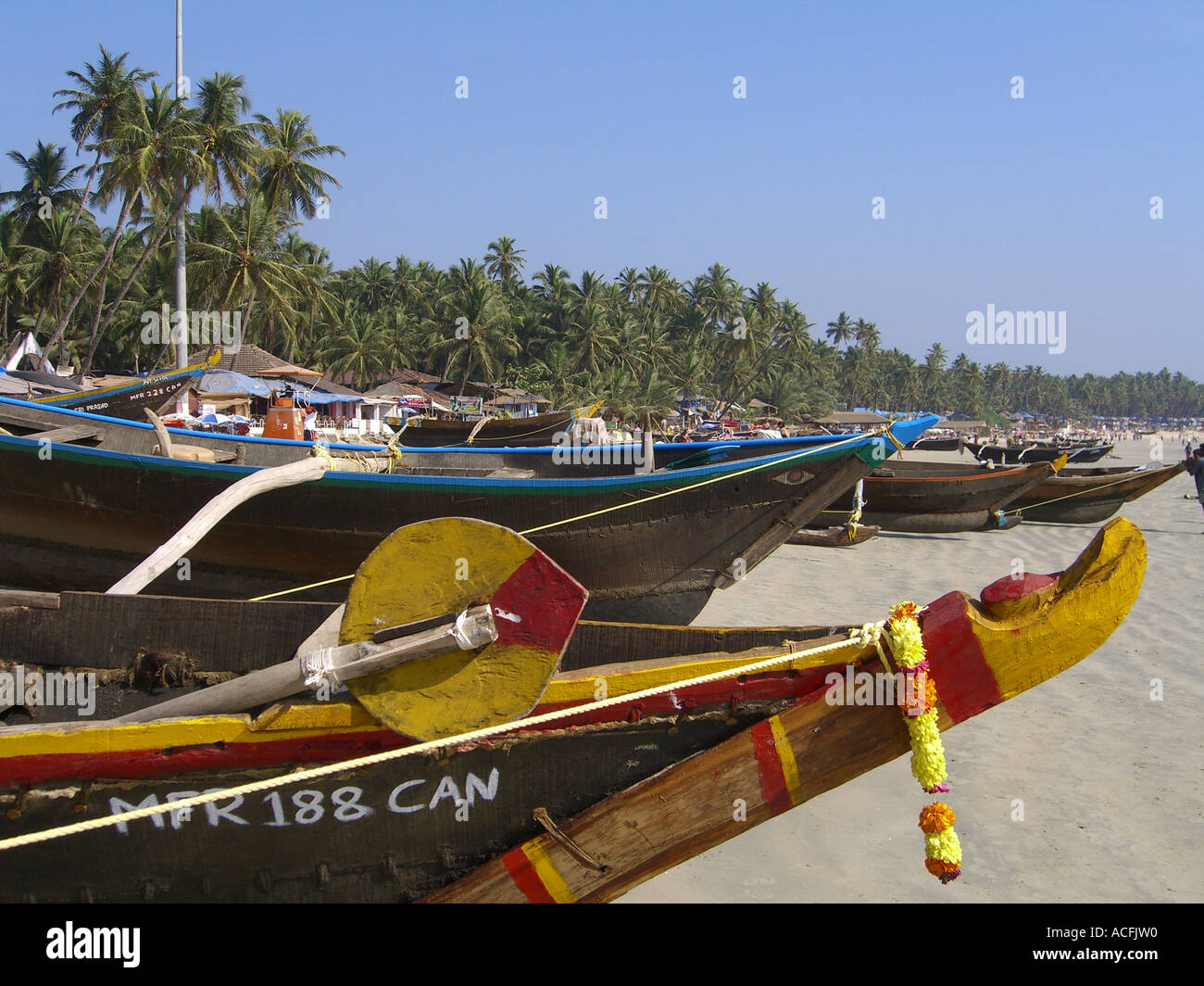 Fish boats in Palolem beach in India Stock Photo