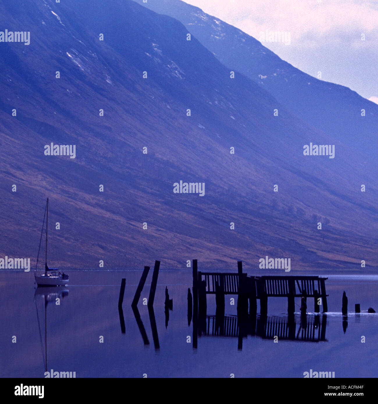 Square format image of Loch Etive Scottish Highlands with a yacht and