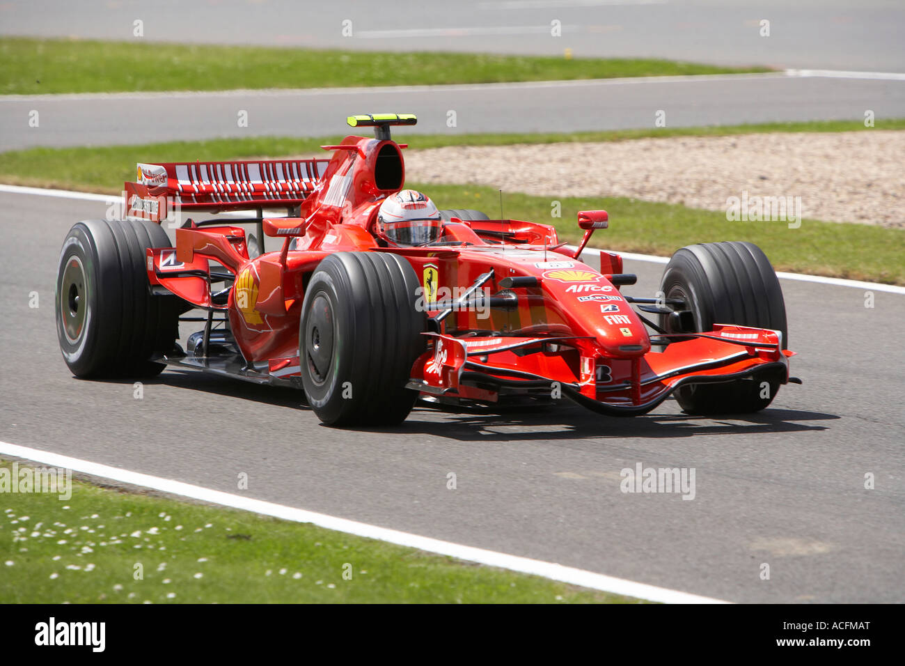 Kimi Raikkonen driving his Ferrari into first place at the British Grand Prix 2007 Stock Photo