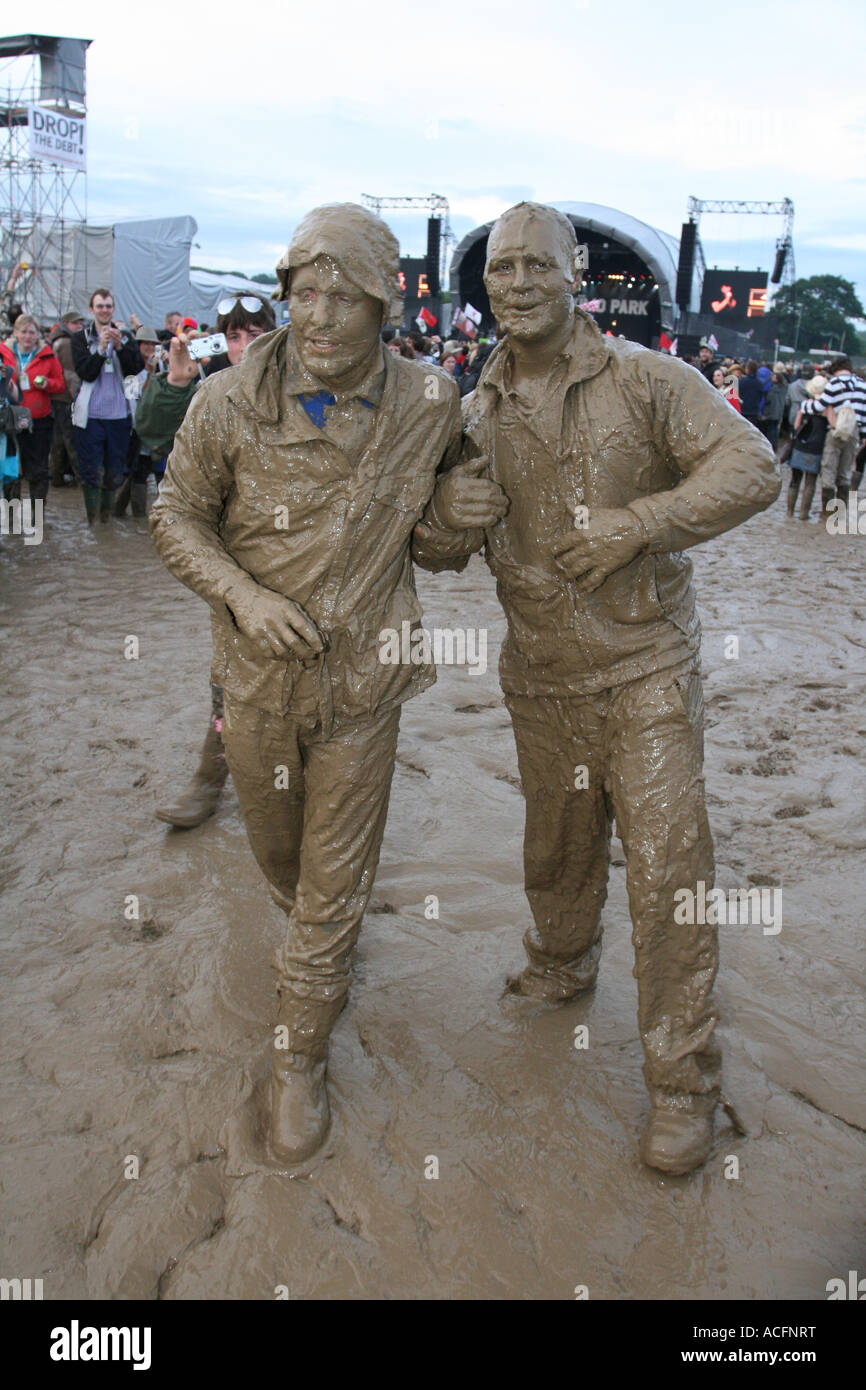Two guys covered in mud at the Glastonbury Festival 2007. Stock Photo