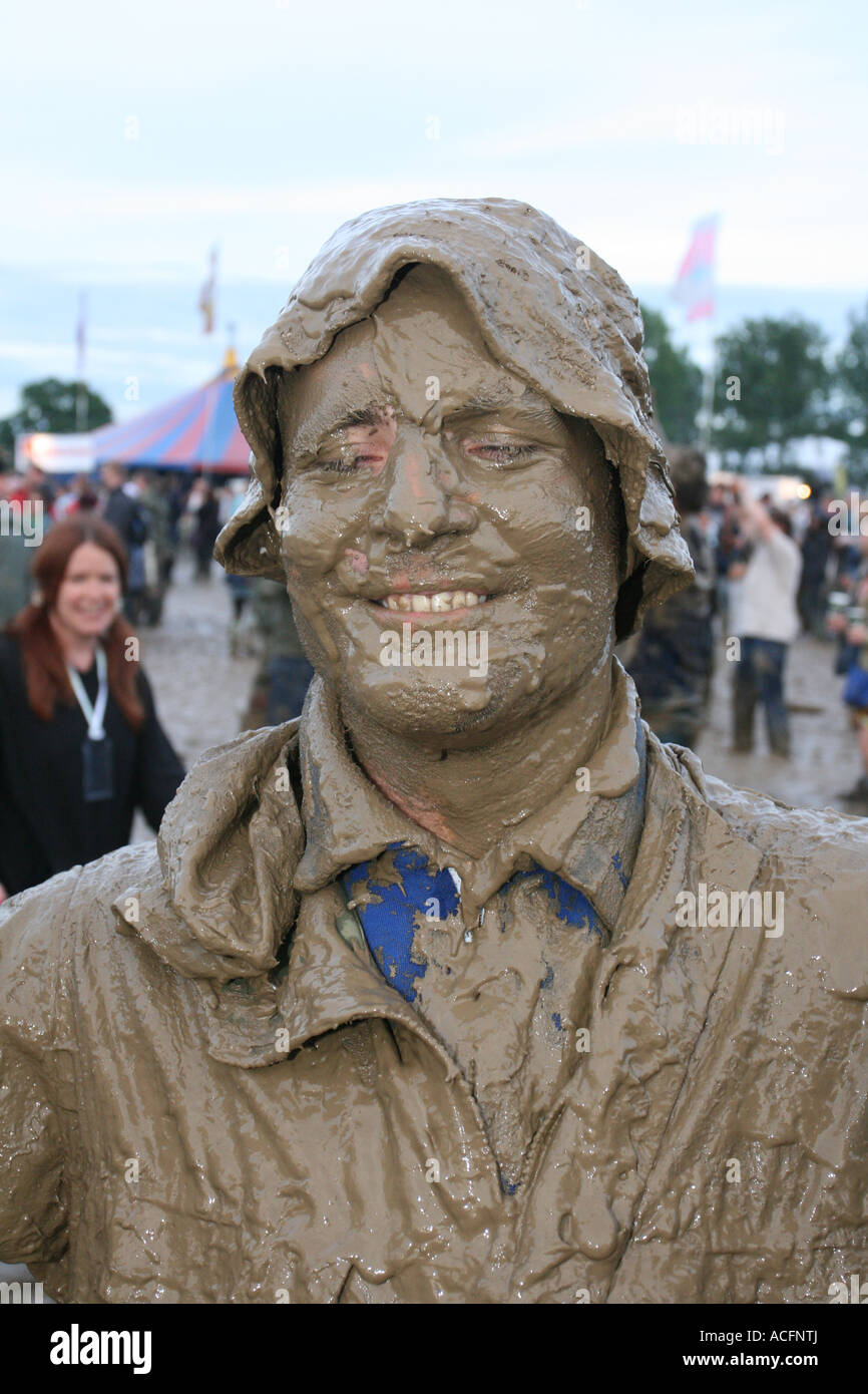 Man covered in mud at the Glastonbury festival 2007. Stock Photo