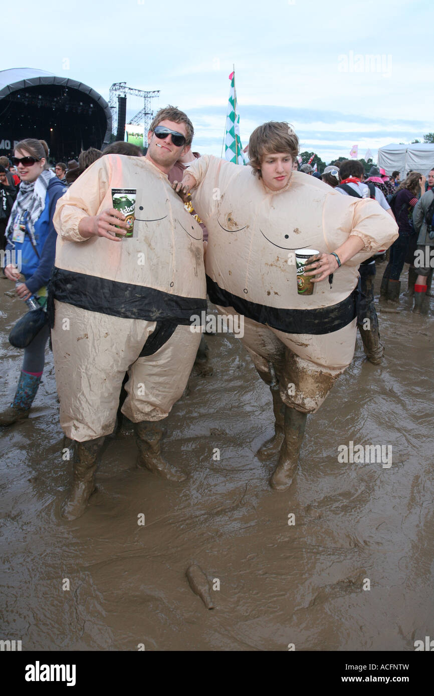 Two young men dressed as Sumo wrestlers at the Glastonbury music festival 2007. Stock Photo