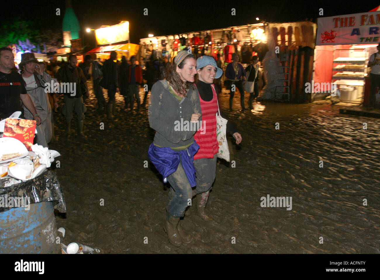 Muddy crowds at night, Glastonbury festival 2007. Stock Photo