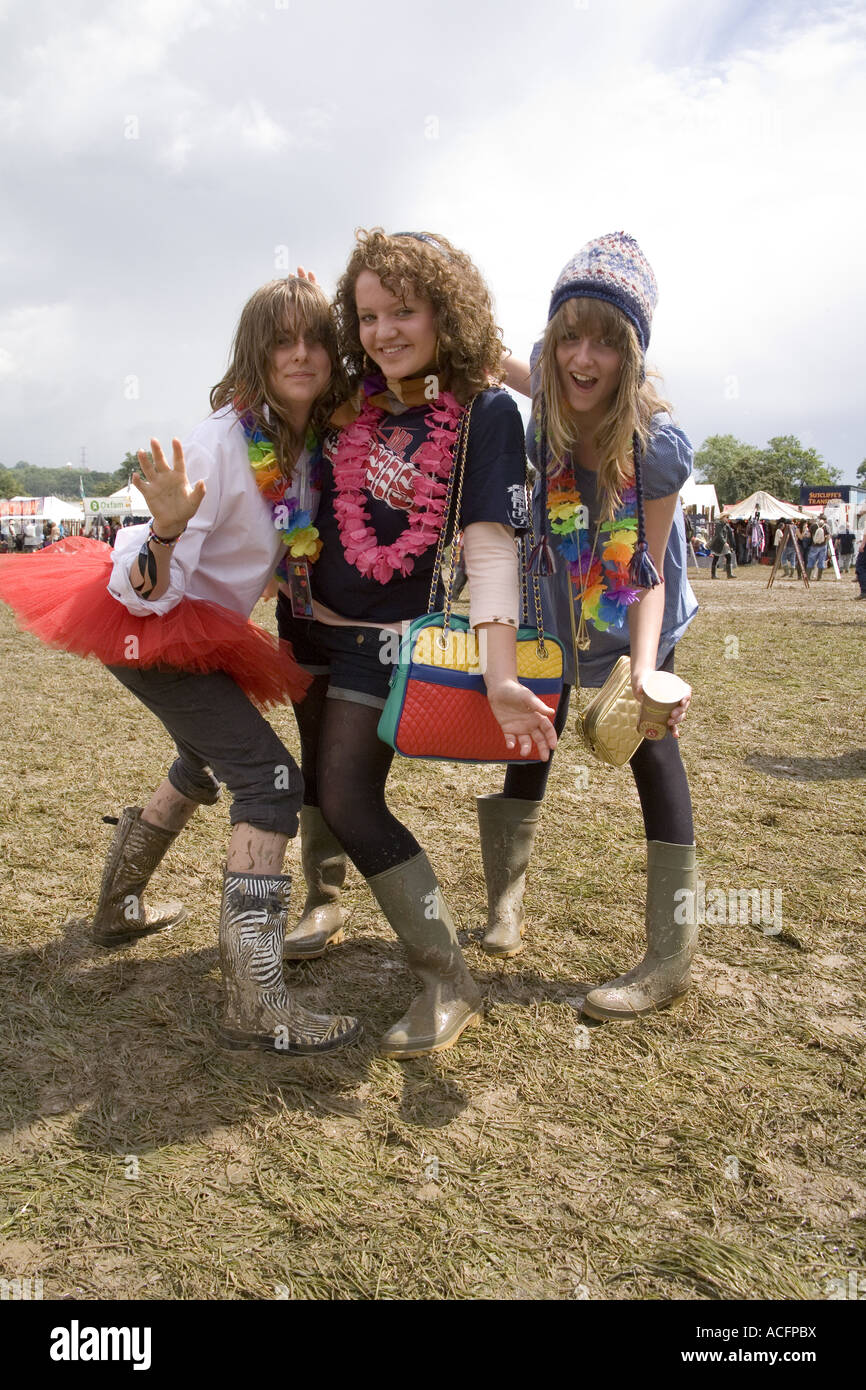 Girls wearing muddy boots at the Glastonbury Festival 2007 Stock Photo -  Alamy