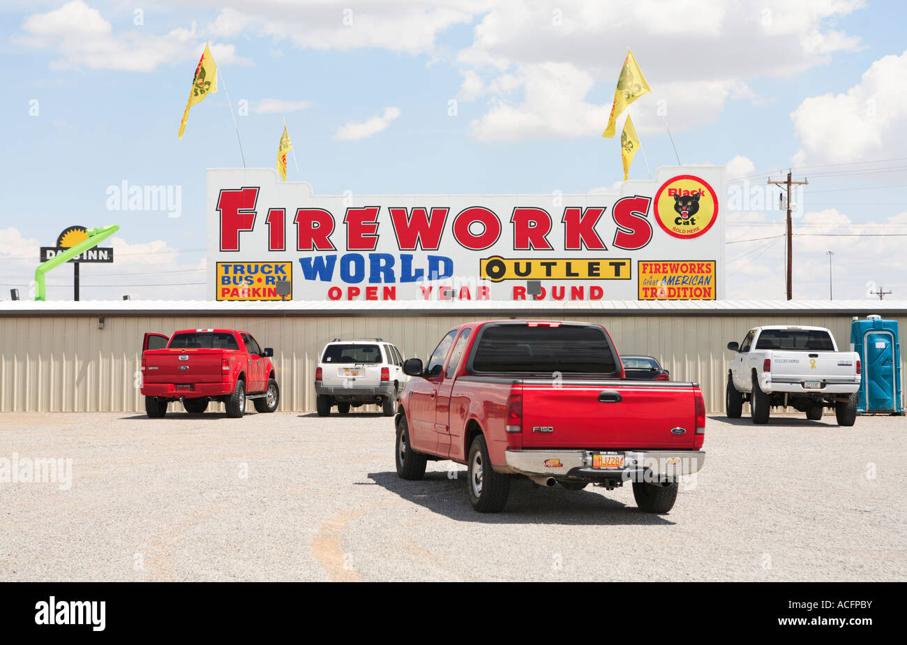 Fireworks store outlet with pickup trucks in parking lot Route 66