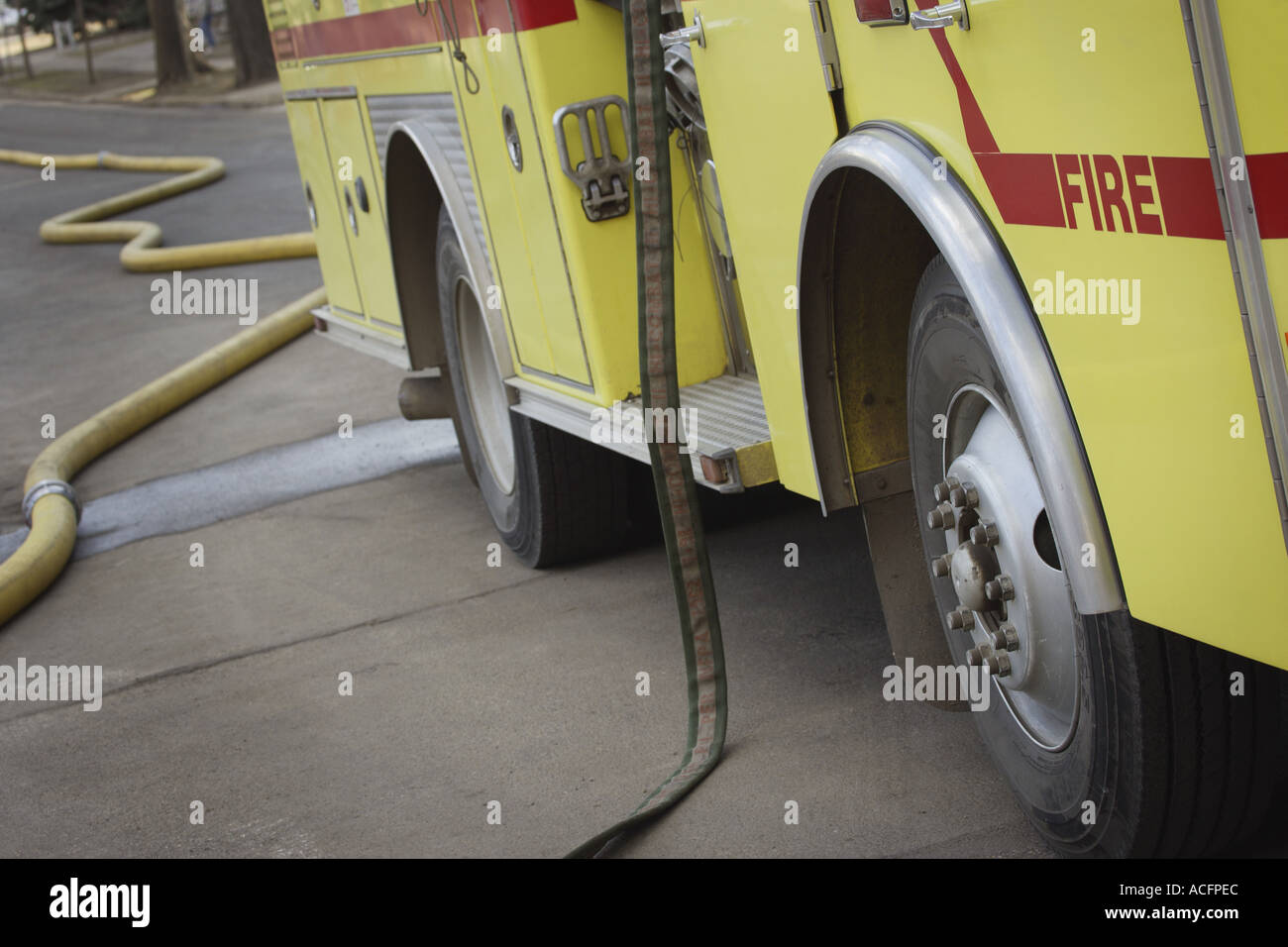 Fire truck and hoses Stock Photo Alamy