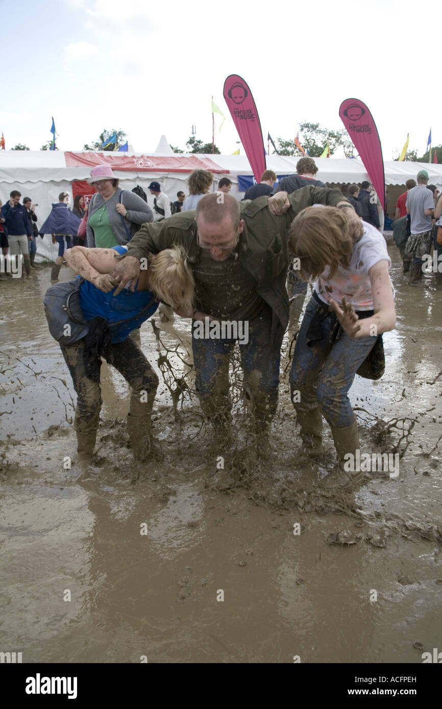 The muddy crowd at the Glastonbury music festival 2007 Stock Photo
