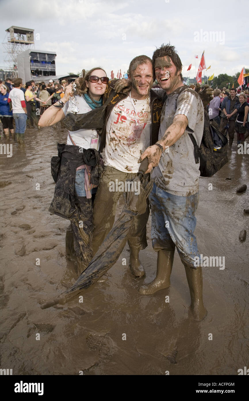 Punters covered in mud at the Glastonbury music festival 2007 Stock Photo