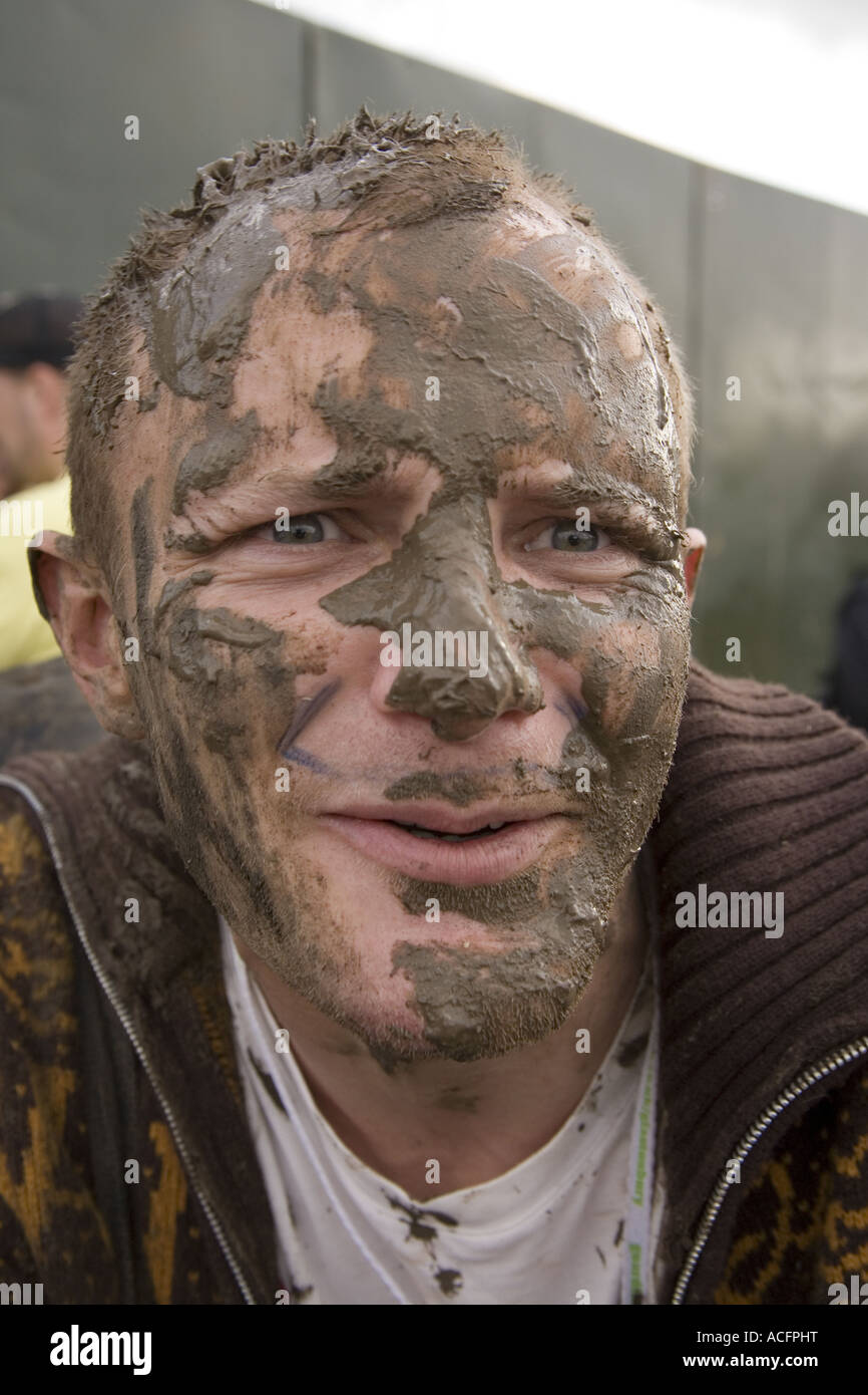Muddy punter at the Glastonbury festival 2007 Stock Photo