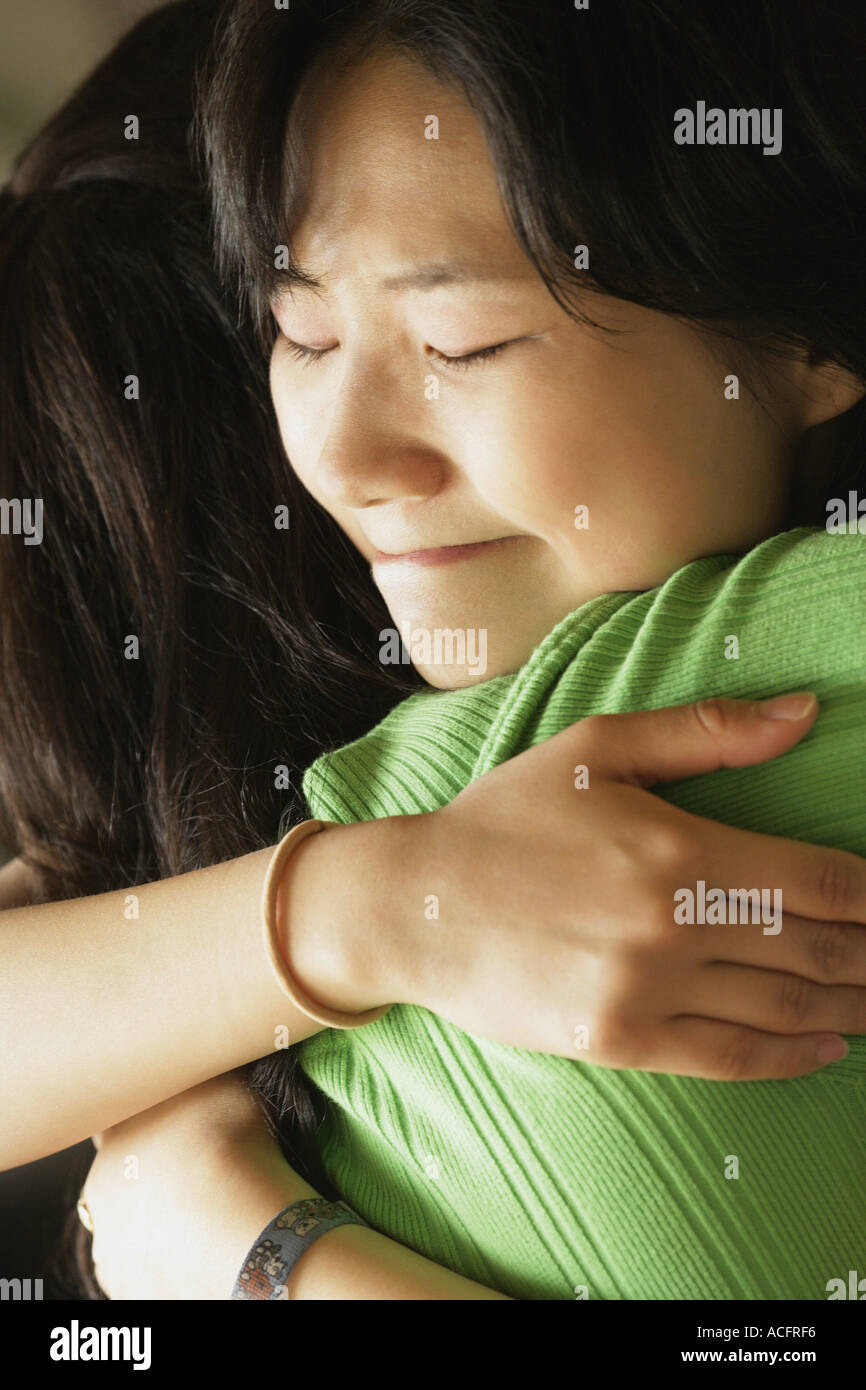 Women hugging Stock Photo