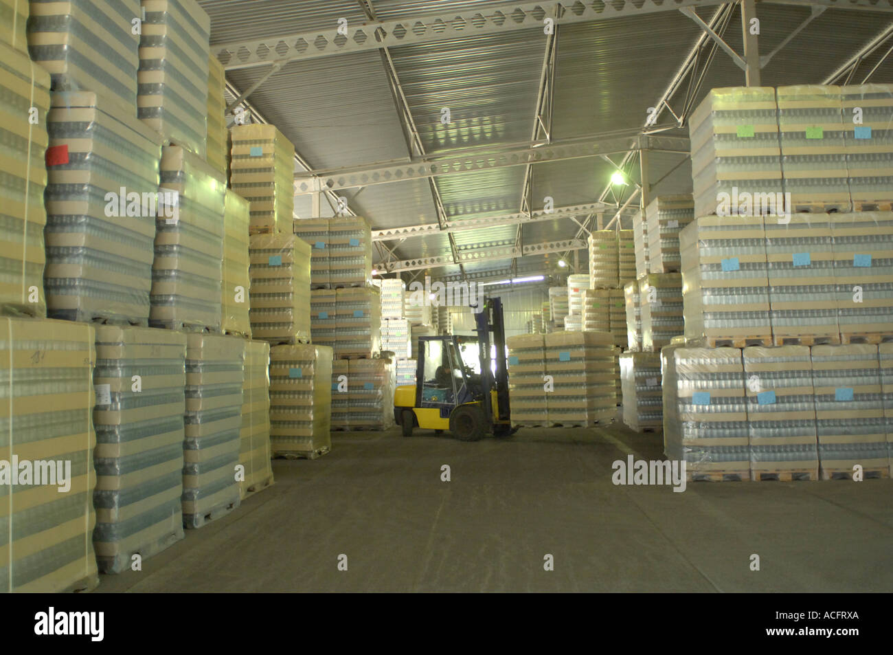 Glass bottles at a warehouse at Gostomel bottle making factory near Kiev in Ukraine Stock Photo