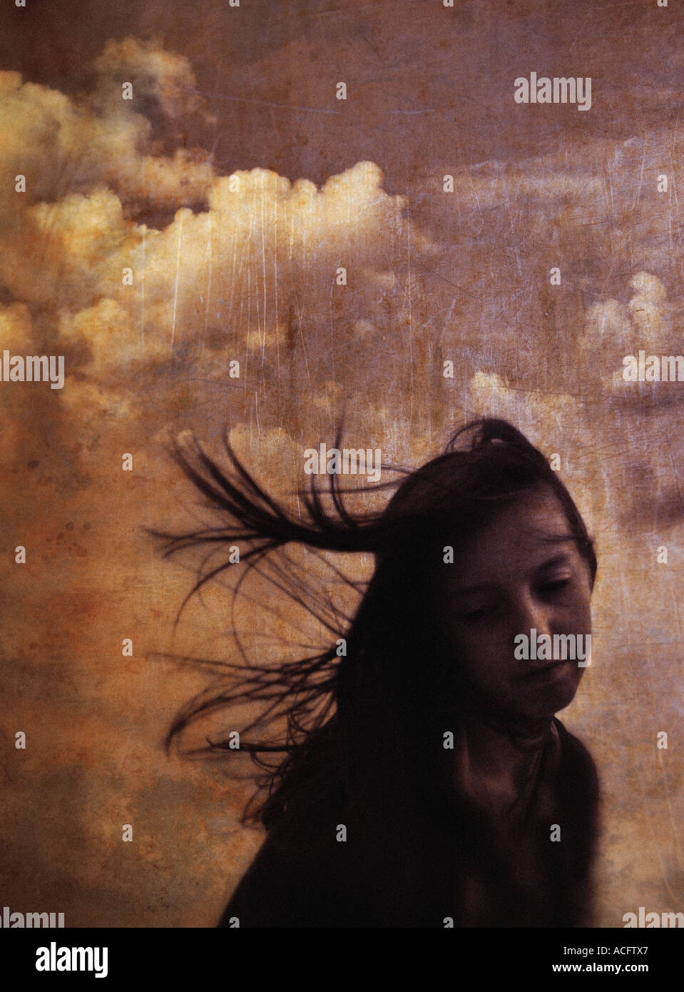 photo of a teenage girl with her hair blowing in the wind Stock Photo ...