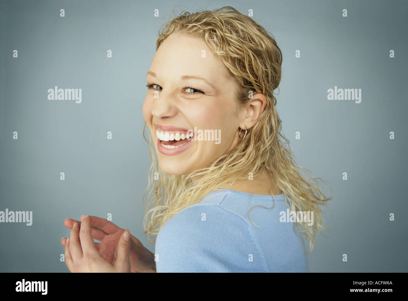 Laughing pretty teenager Stock Photo