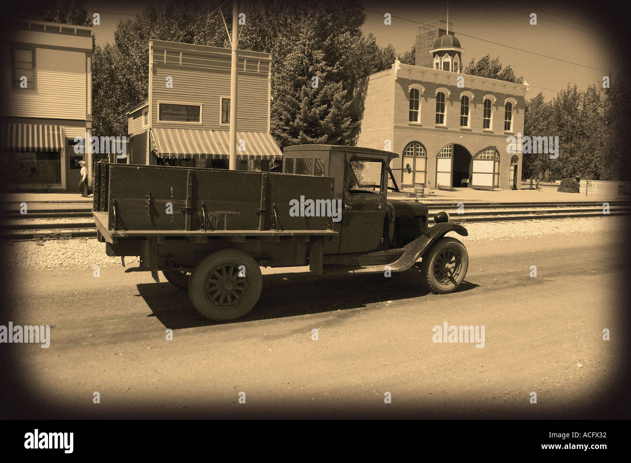 Old fashioned sepia truck and road Stock Photo