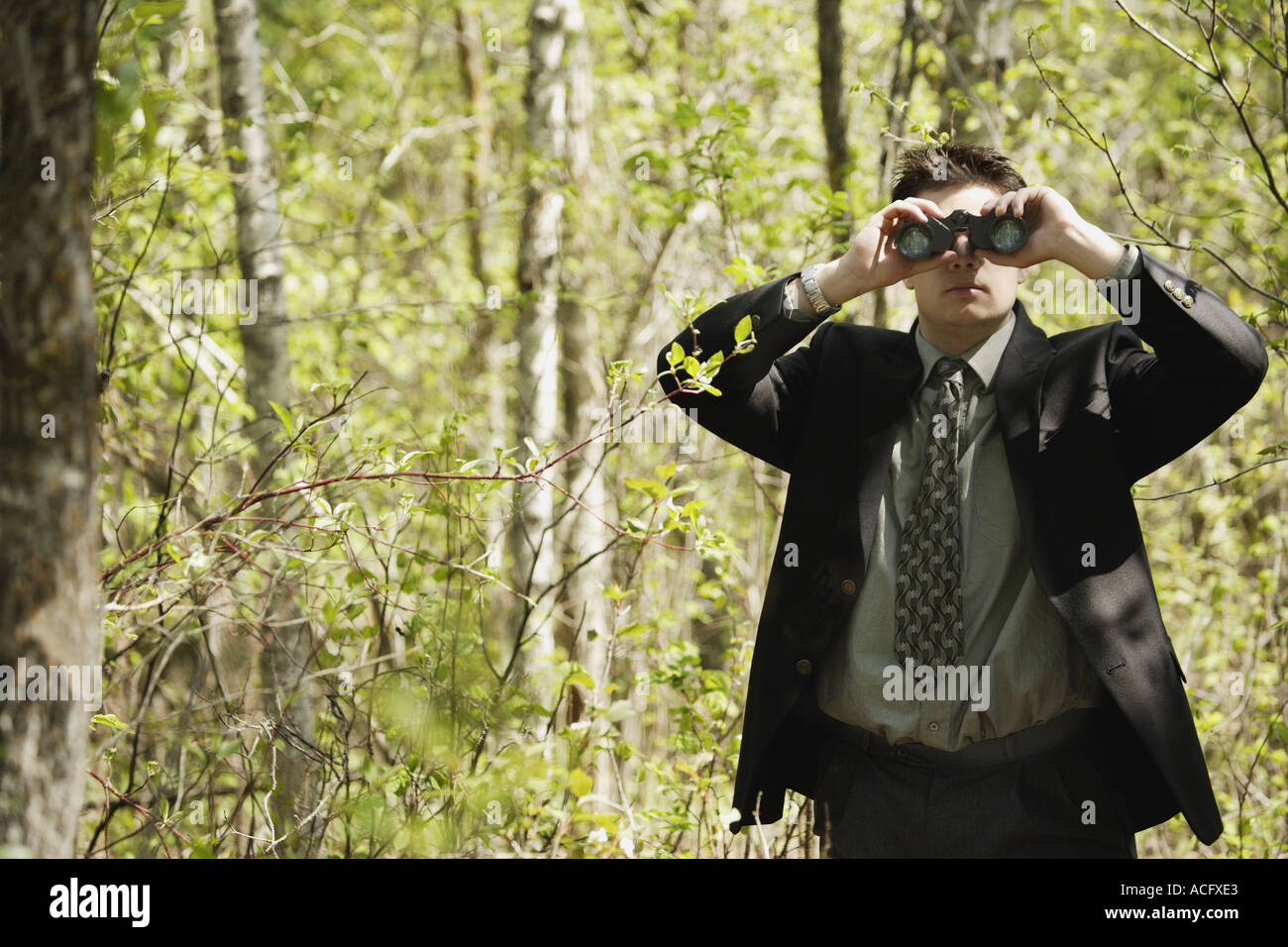 Man binoculars spying hi-res stock photography and images - Alamy