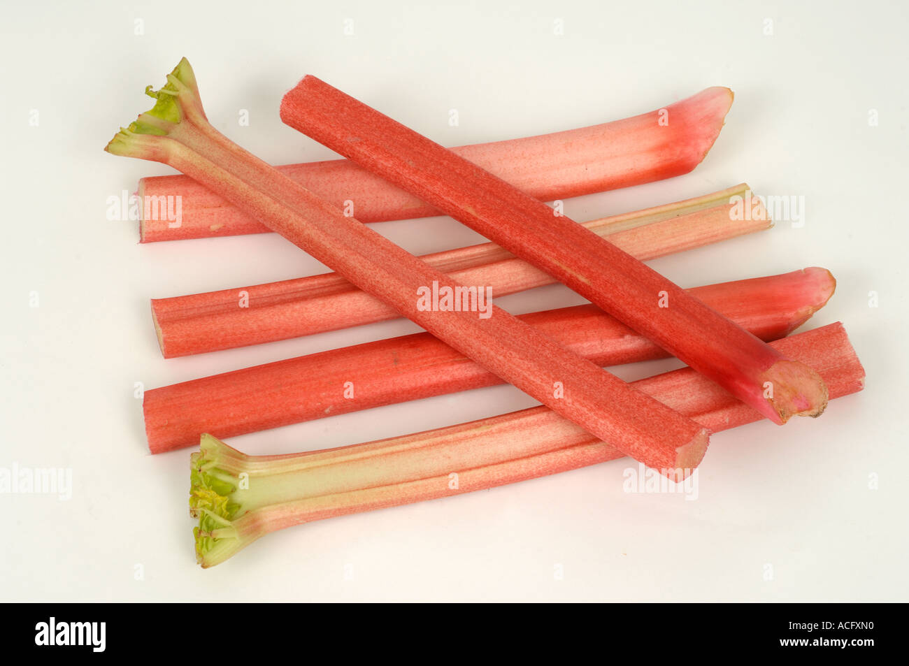 Vegetable produce typical supermarket bought rhubarb sticks Stock Photo