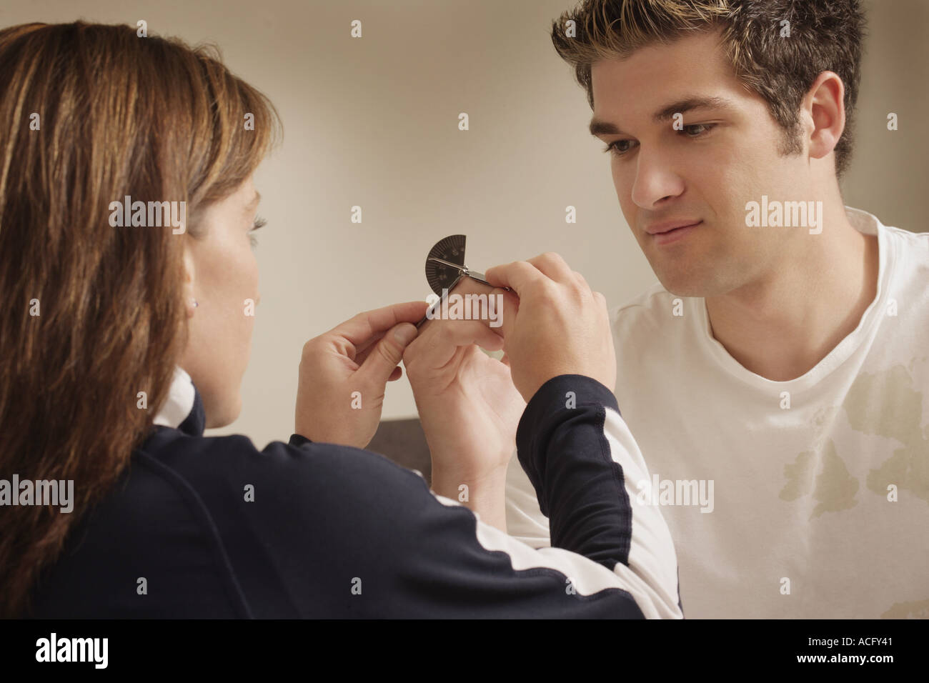 Teen having finger checked Stock Photo