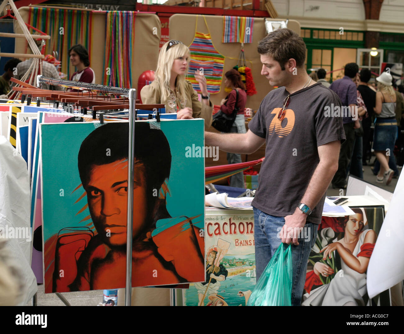 Art for sale. Spitalfields market, London, England Stock Photo Alamy