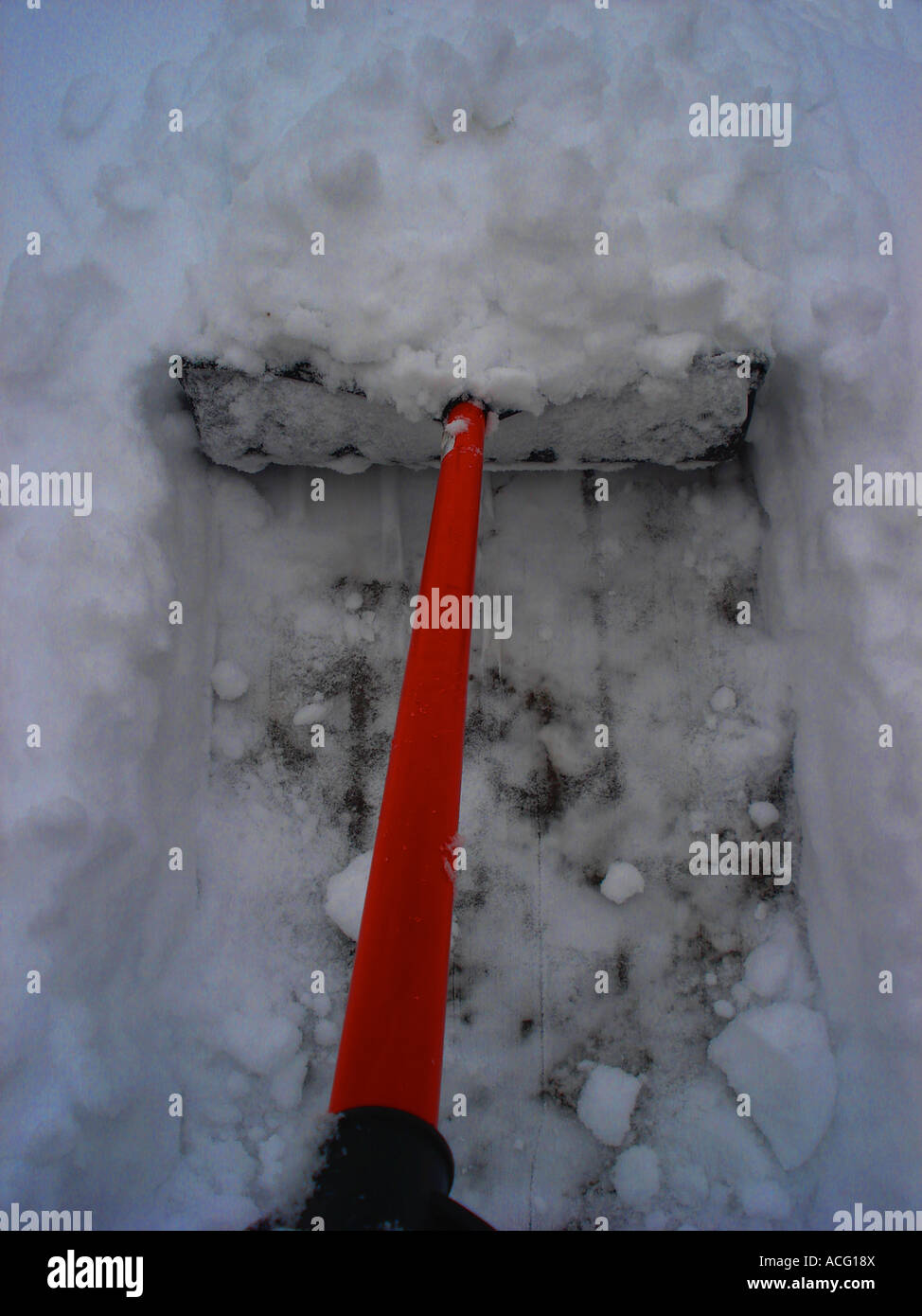 Shoveling snow in Denver Colorado During December. Stock Photo