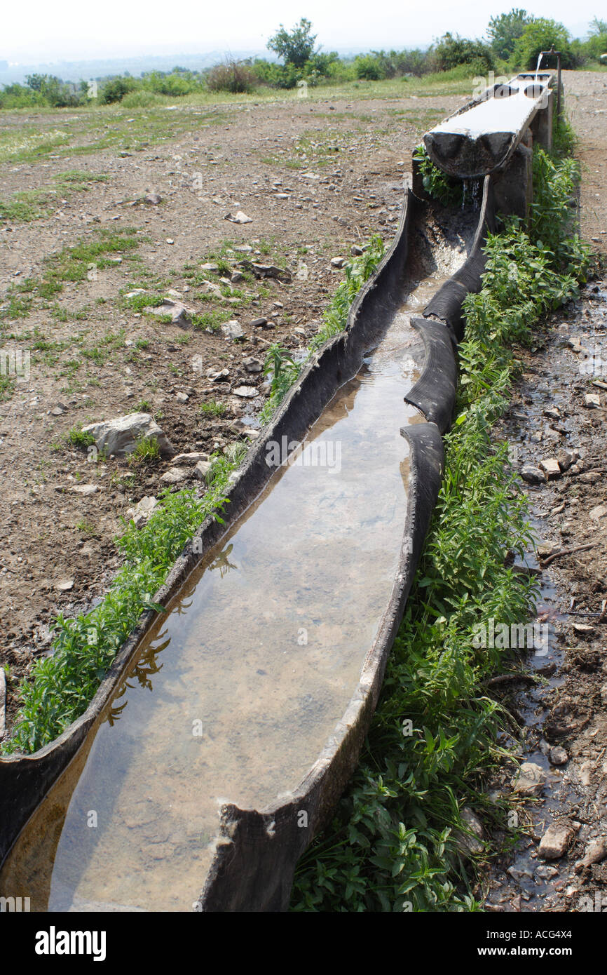 Faucet and water for the animals near vilage of Glushnik Stock Photo