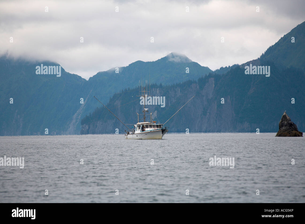 Fishing boat in Resurrection Bay off Seward Alaska Stock Photo - Alamy
