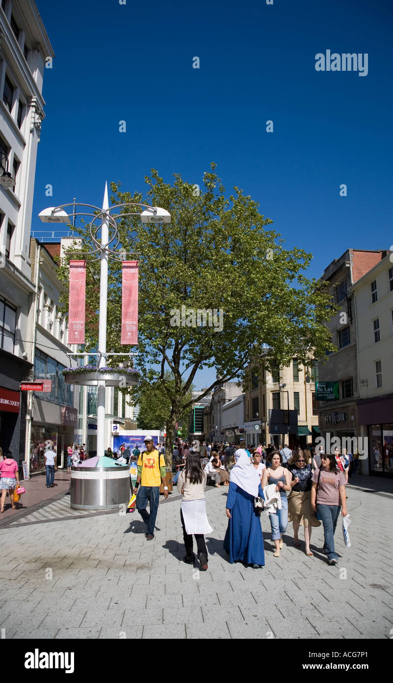 Shoppers in pedestrianised shopping street in city centre Cardiff Wales UK Stock Photo