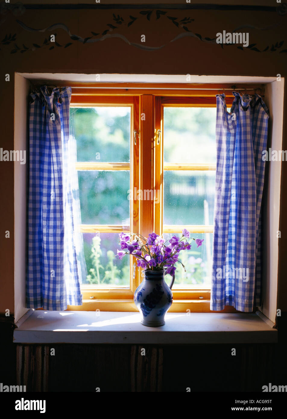 Flowers on a windowsill Stock Photo Alamy