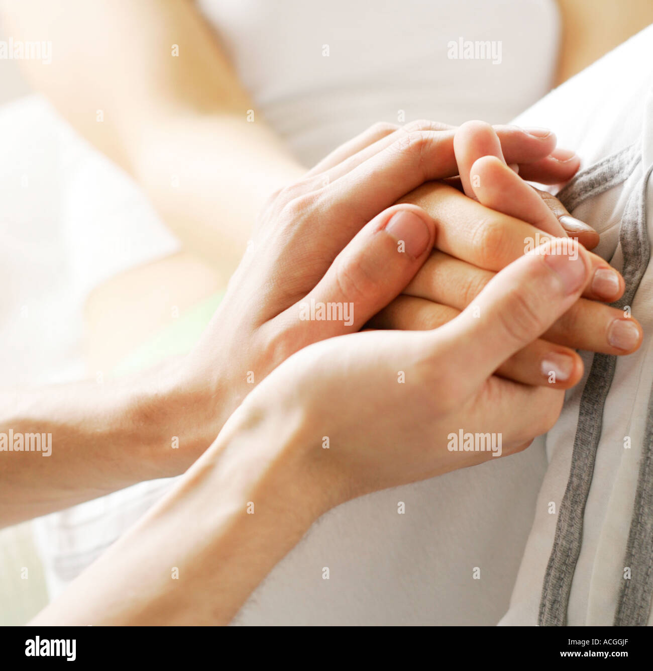 Male and female hands Stock Photo