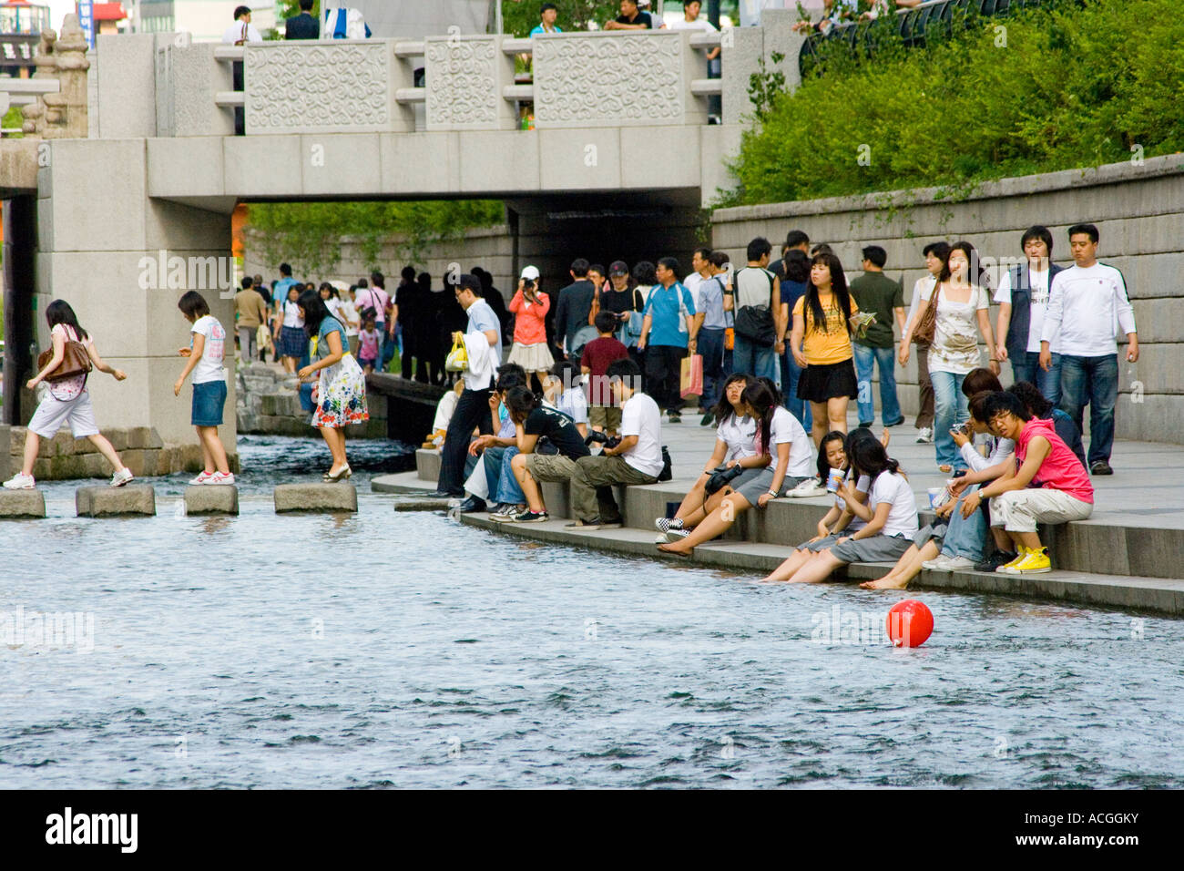 Many Korean People Walking along Cheonggyecheon or Cheonggye Stream Seoul South Korea Stock Photo