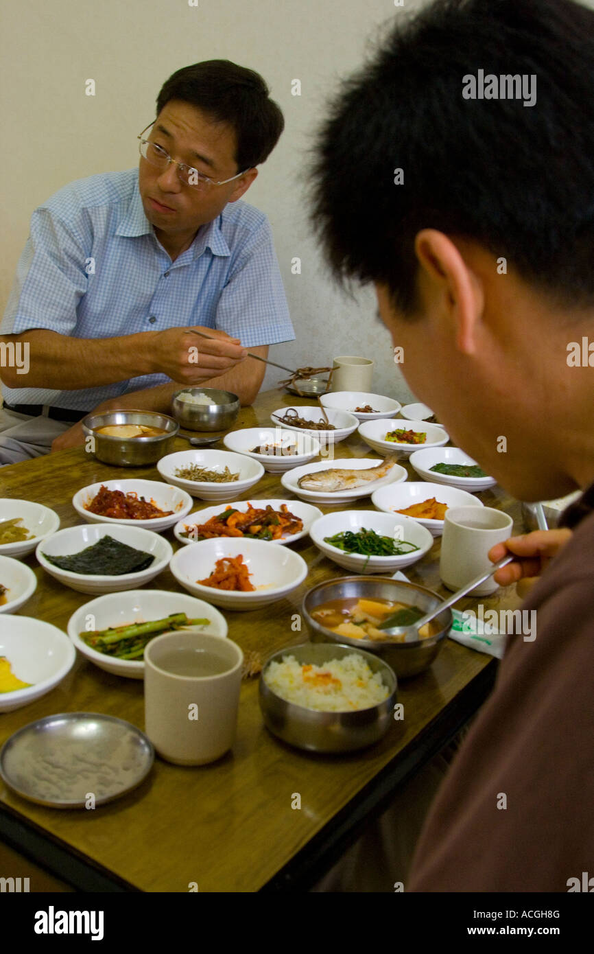 Korean Men Eating a Typical Traditional Korean Meal, Seoul, South Korea Stock Photo
