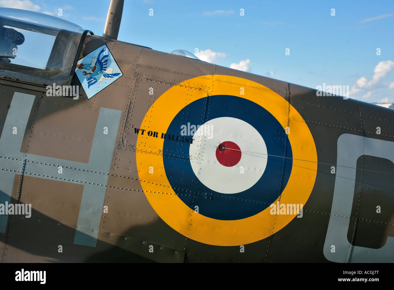 Spitfire detail showing Polish Squadron logo RAF roundel and wt or ballast sign Stock Photo