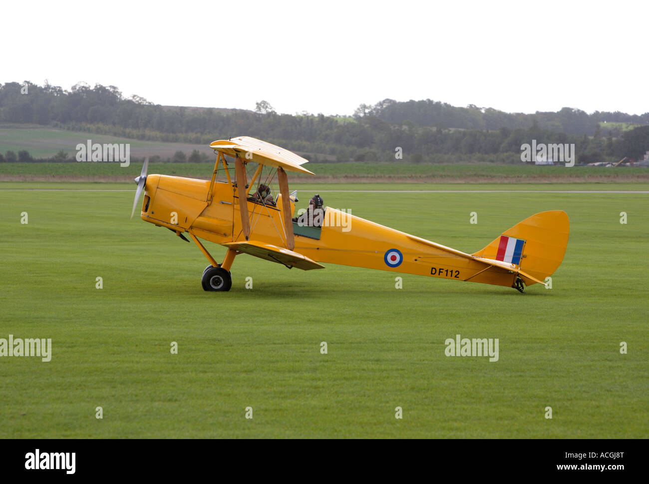 G ANRM DF112 De Havilland DH82A Tiger Moth with military markings, Duxford, UK October 2006 Stock Photo