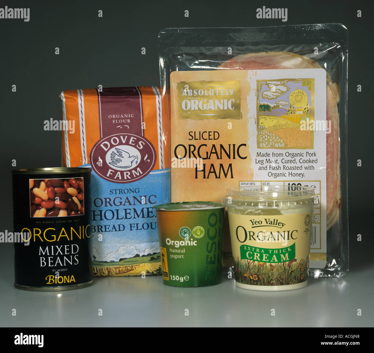 Selection of organic produce including cream yogurt flour ham beans Stock Photo