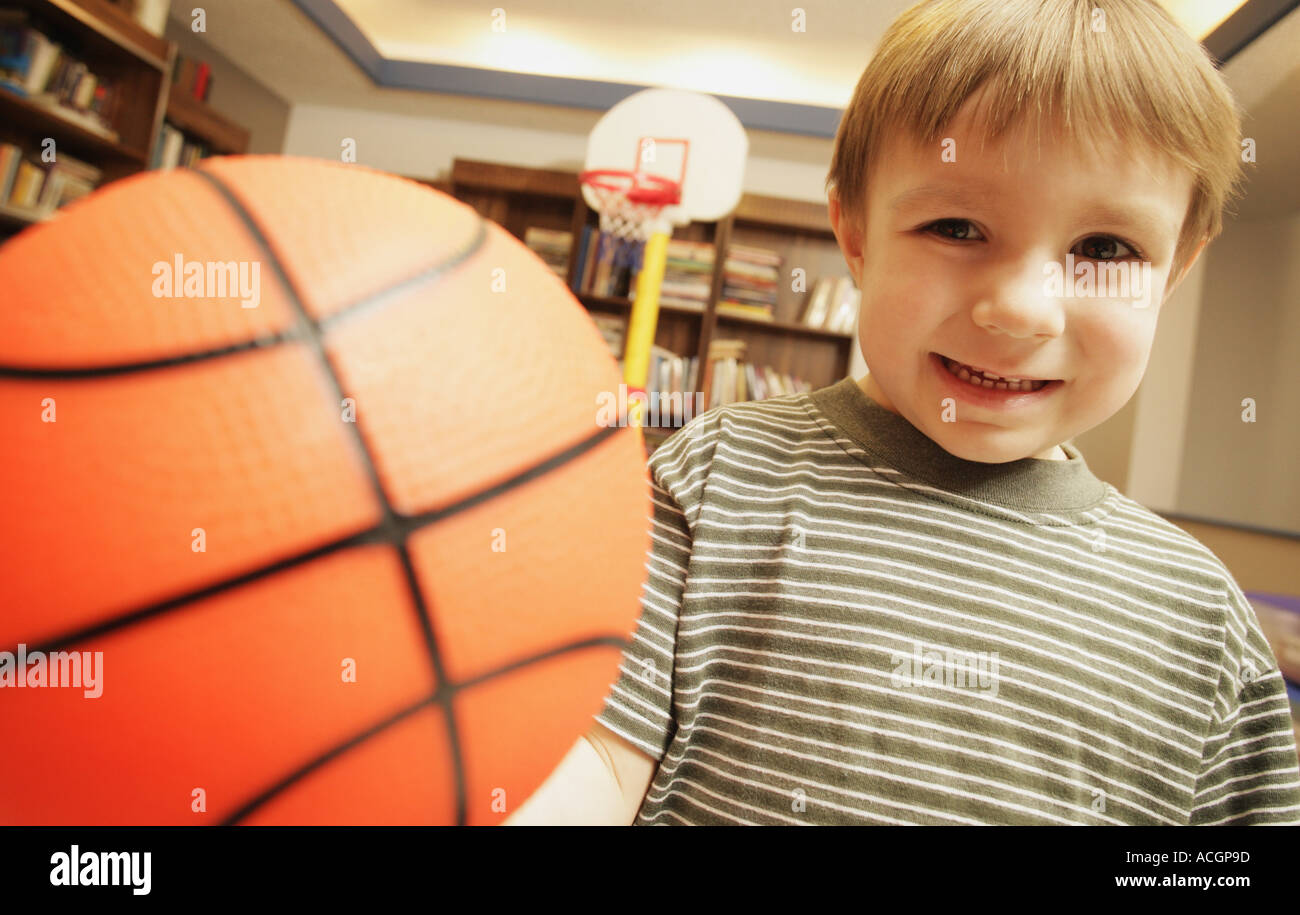 Little boy with basketball Stock Photo Alamy