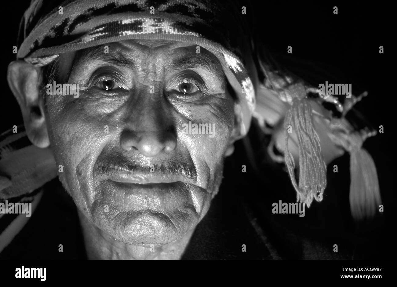 Religious Maya elder wearing a woven headcloh symbol of his authority Santiago Atitlan Guatemala Monochrome photograph Stock Photo