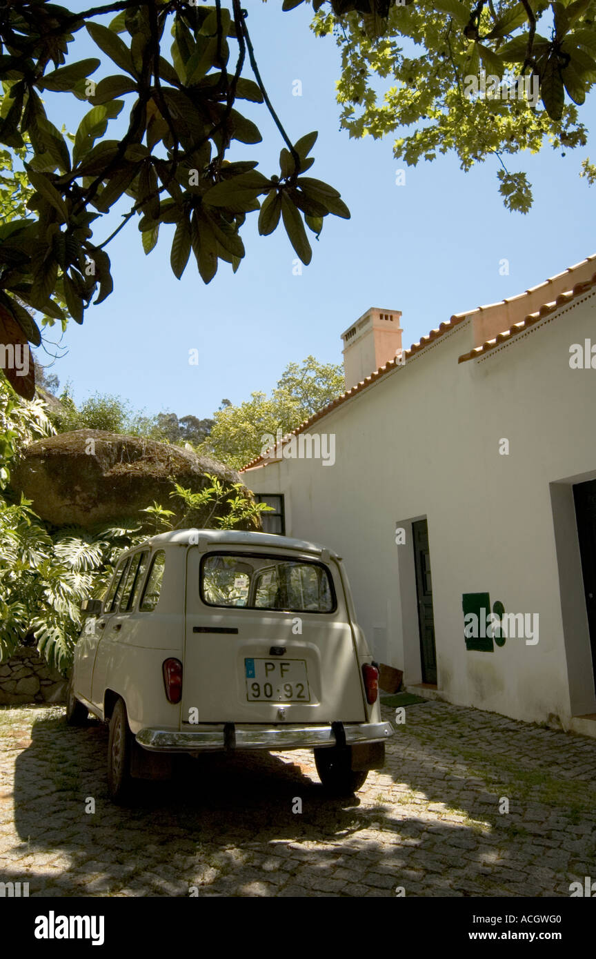 an old car parked outside of a cottage in Monchique Algarve Portugal Stock Photo Alamy