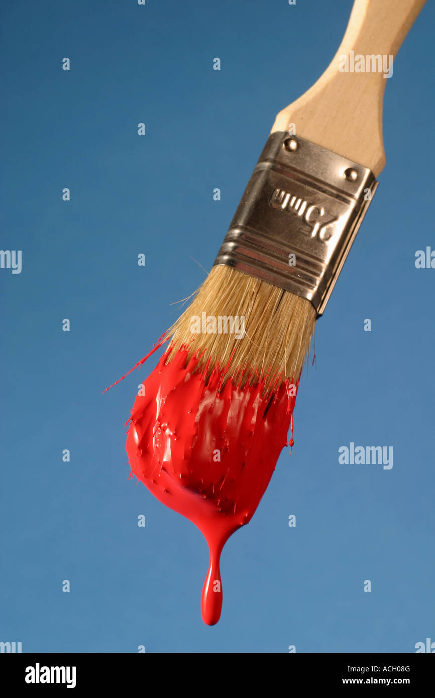 25 mm paint brush with red paint dripping Stock Photo