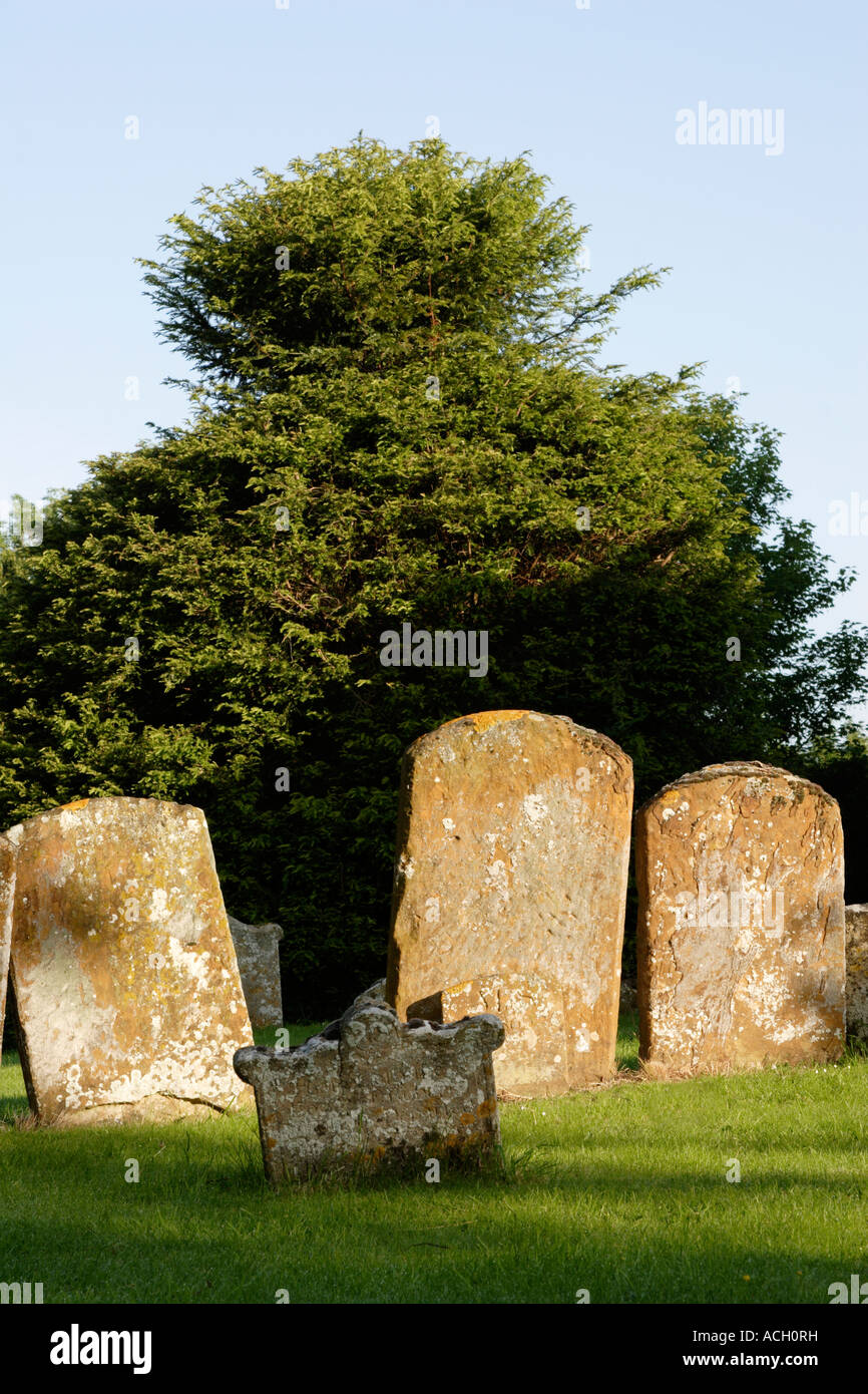 Gravestones in graveyard, Stoke Goldington, Buckinghamshire, England, UK Stock Photo