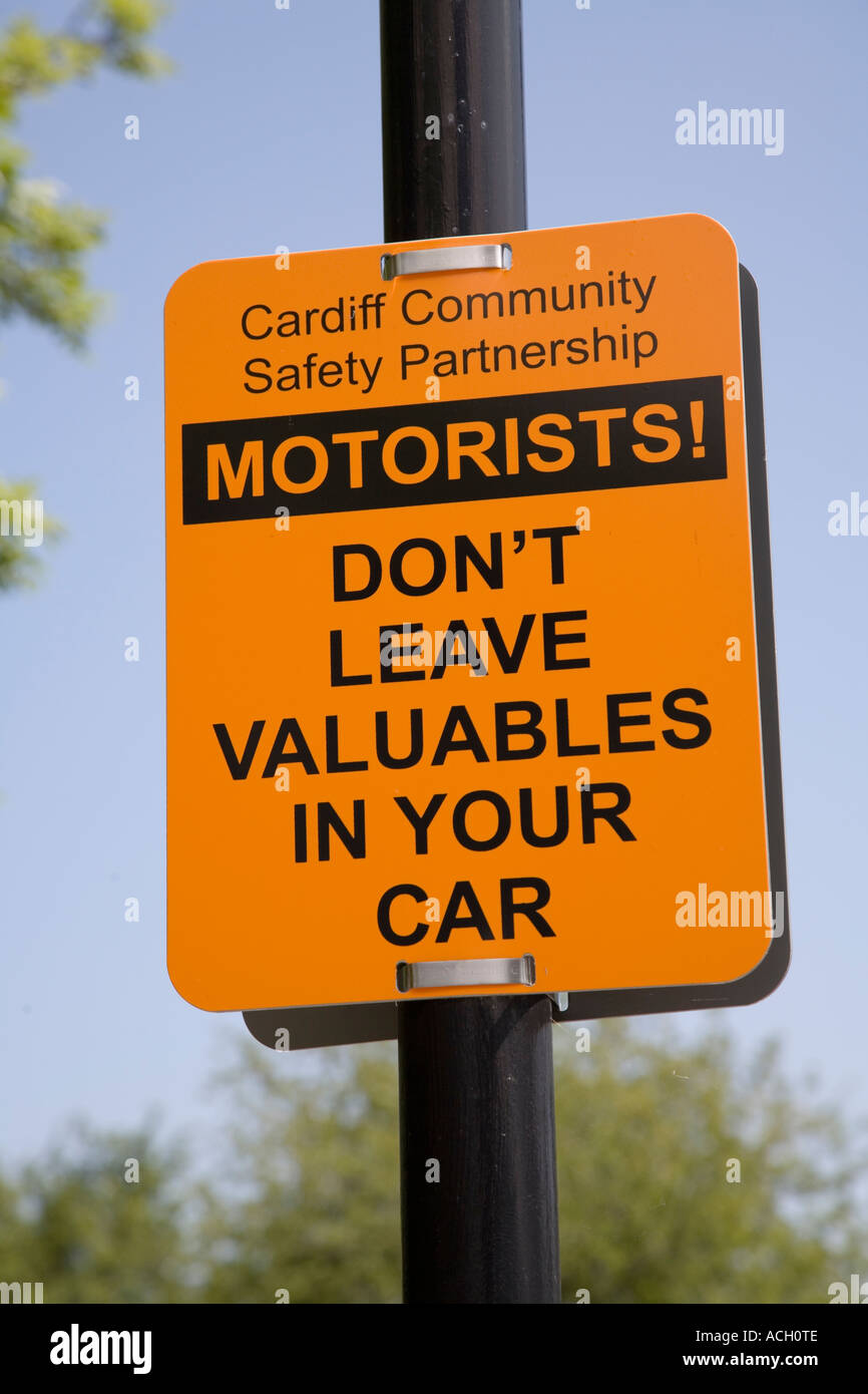 Warning notice in car park to not leave valuables in cars Cardiff Wales UK Stock Photo