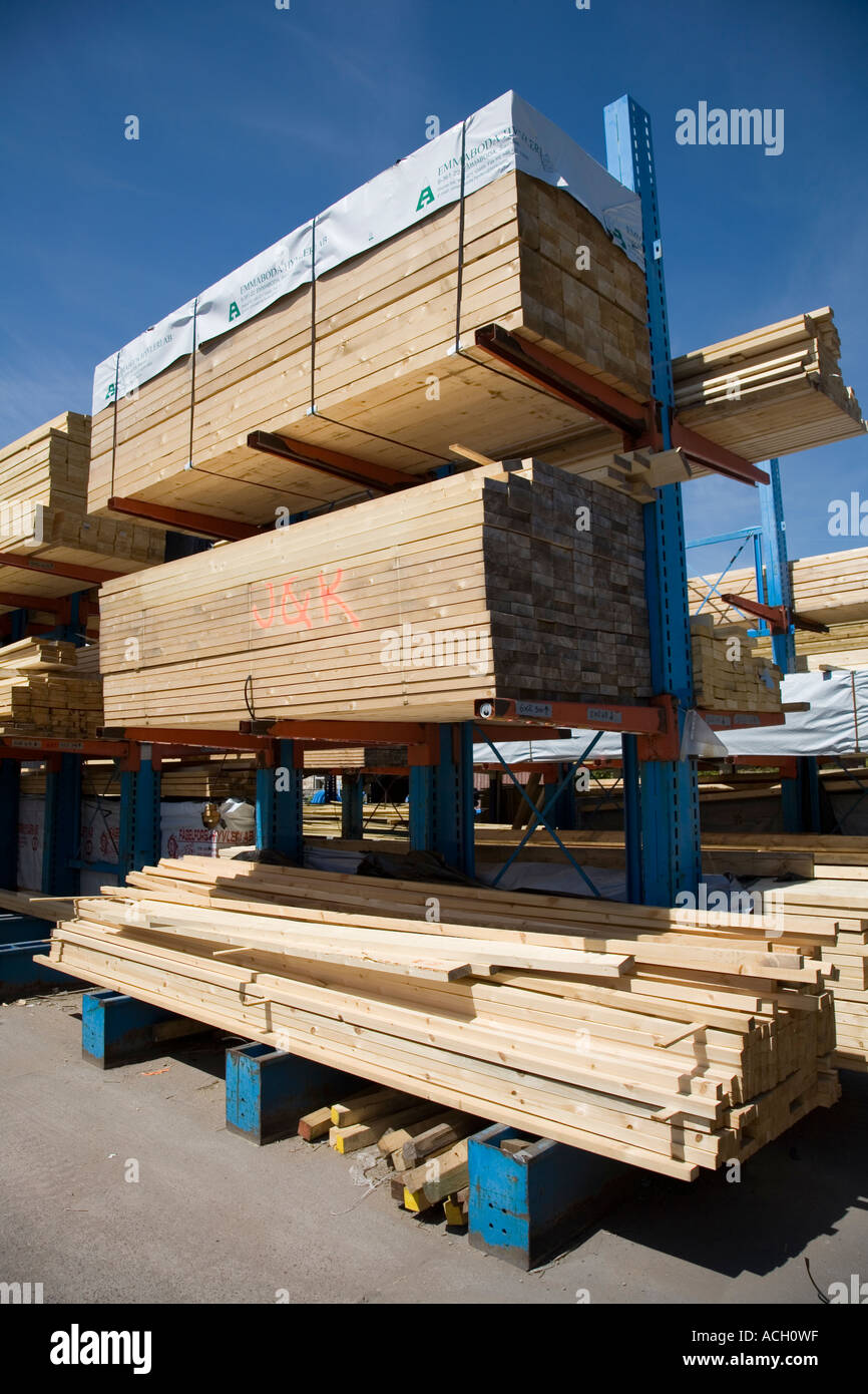 Sawn and planed timber on racks in builder s yard Hereford England UK Stock Photo